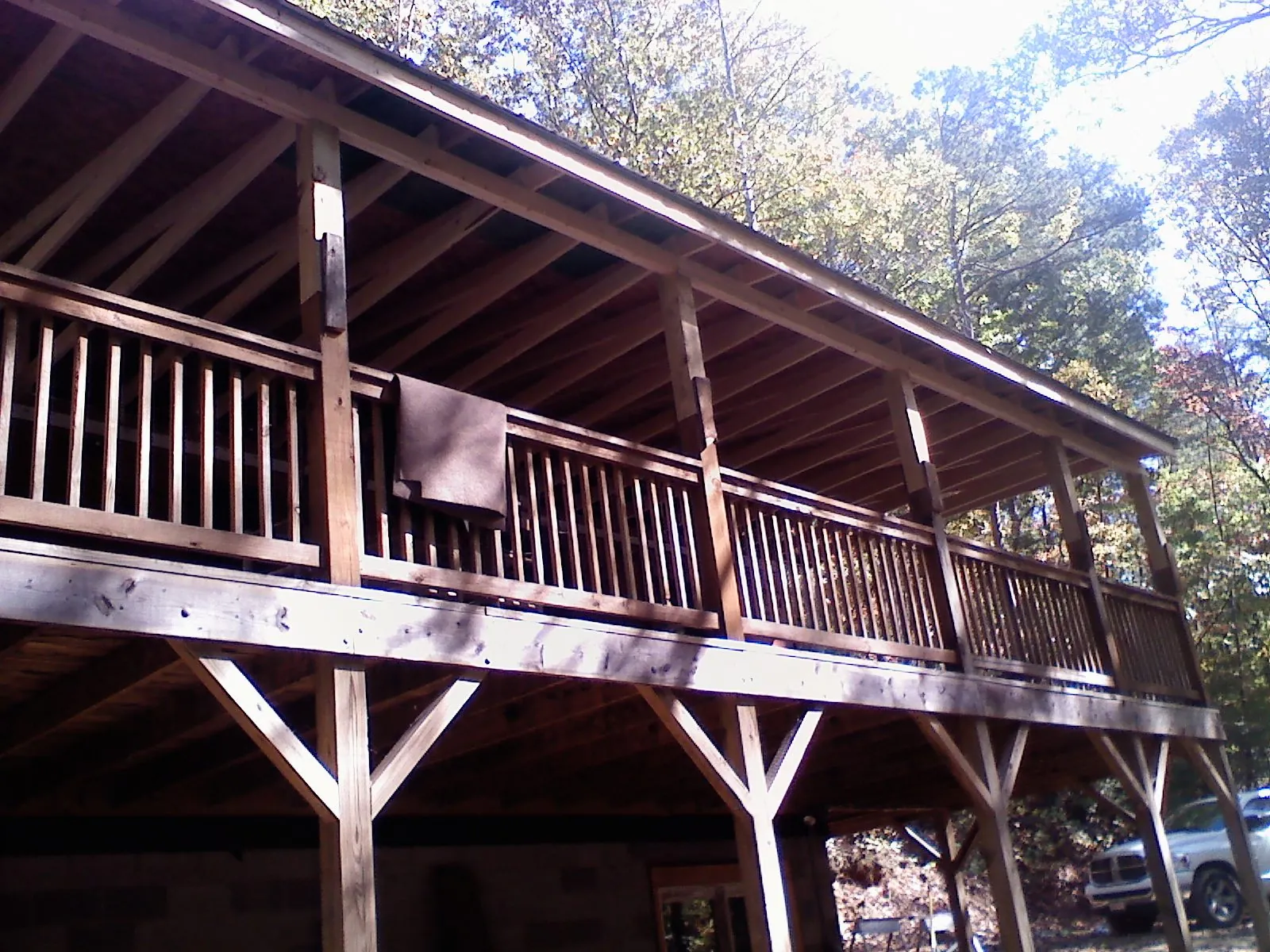 Timber framing under a new elevated porch and deck — Roof Leak Repair in Hillsboro by Roofing Brothers